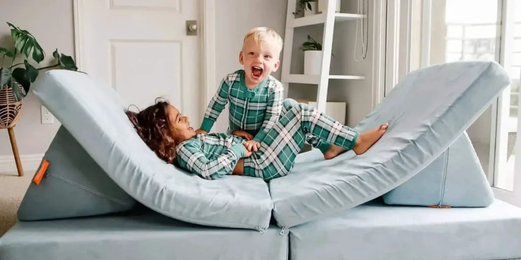 kids playing on nugget couch