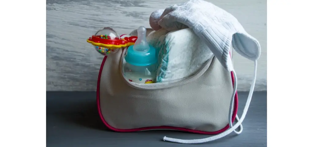 bag with diapers and bottle