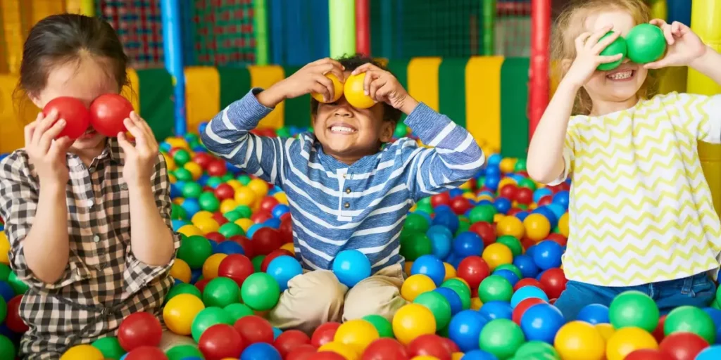 kids playing in ball pit