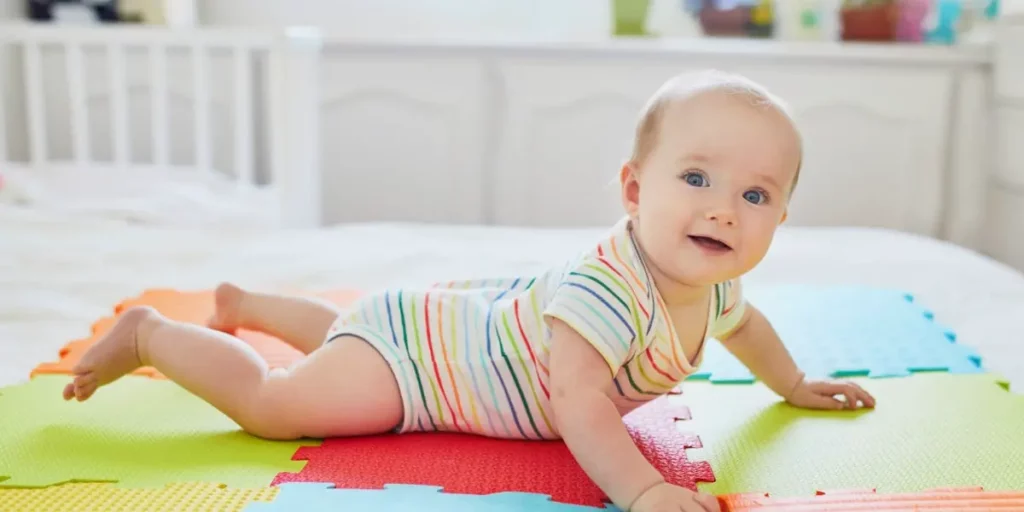 baby in play mat