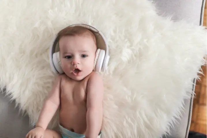 gaping baby wearing noise cancelling headphones