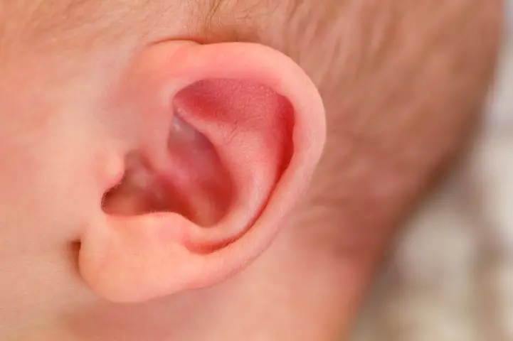 baby's left ear closeup