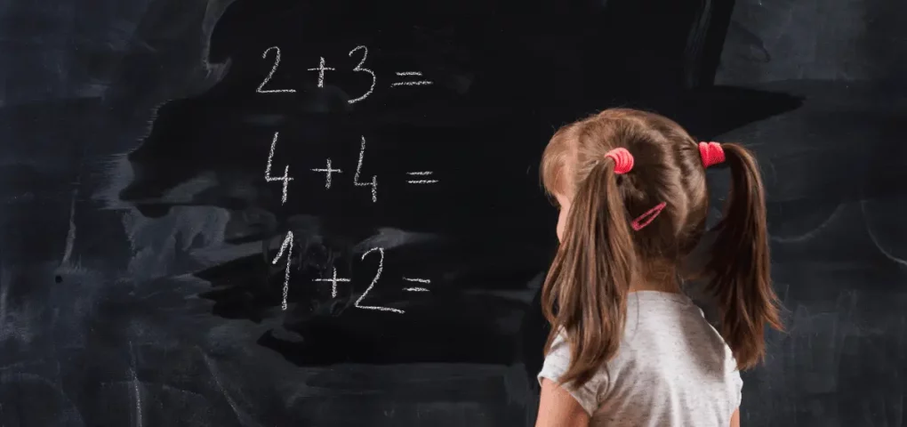 preschooler trying to solve simple math problems
